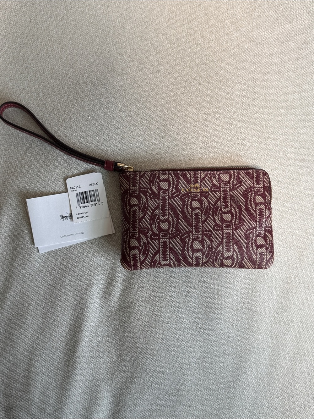 Coach Burgundy Signature Chain Print Wristlet